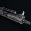 Olight Odin tactical flashlight mounted on a rifle Picatinny rail isolated on black background