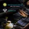 Olight Black I3T Flashlight in hand, illuminating a car engine for automotive repair with its 180 lumen CW LED and TIR optic lens.