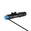 Olight tactical flashlight charging with blue magnetic MCC USB cable on white background