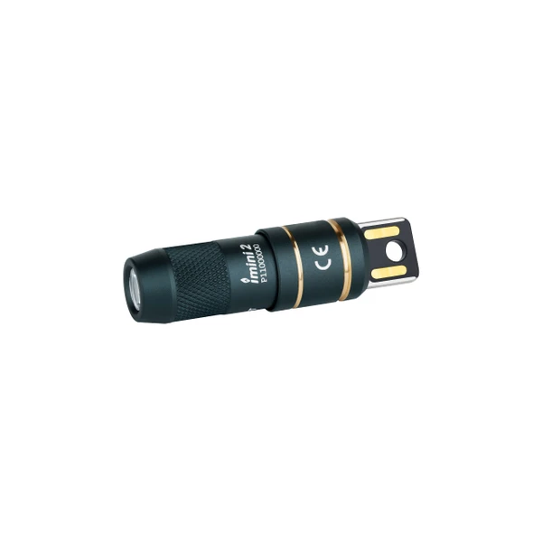 Compact dark green imini 2 flashlight with gold accents and magnetic quick-release base.
