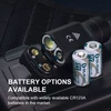 Olight PL TURBO flashlight battery compartment open with CR123A batteries, showing power versatility.