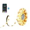 Warm white LED strip lights on a roll with a smartphone app for Bluetooth control