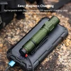 Green flashlight magnetically charging from a solar power bank outdoors, highlighting easy USB charging.