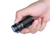 Olight Black Baton 3 Premium Edition Flashlight held in hand with blue accents and pocket clip for everyday carry