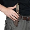 Man retrieving fixed blade knife from brown leather sheath on belt.
