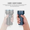 Olight Blue Marauder Mini compact flashlight held in hand, highlighting its portable size for easy handling.