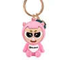Olight pink mascot keychain with cat ears, grumpy expression, and gold keyring.