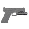Olight Valkyrie Turbo LEP tactical weapon light mounted on a handgun silhouette isolated on a white background