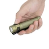 Hand holding olive green textured flashlight with black clip