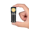 Olight Black PERUN 3 MINI angled flashlight with textured body for hands-free use.