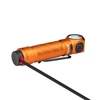 Orange Olight headlamp charging with magnetic cable