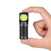 Olight Black PERUN 3 MINI Headlamp held in hand, showing its compact size for everyday carry.