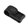 Black tactical flashlight holster, durable nylon belt pouch for everyday carry, outdoor gear storage.