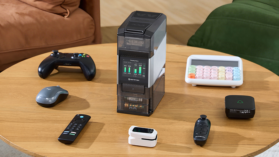 OSTATION smart battery charger and organizer with LCD display showing charging status