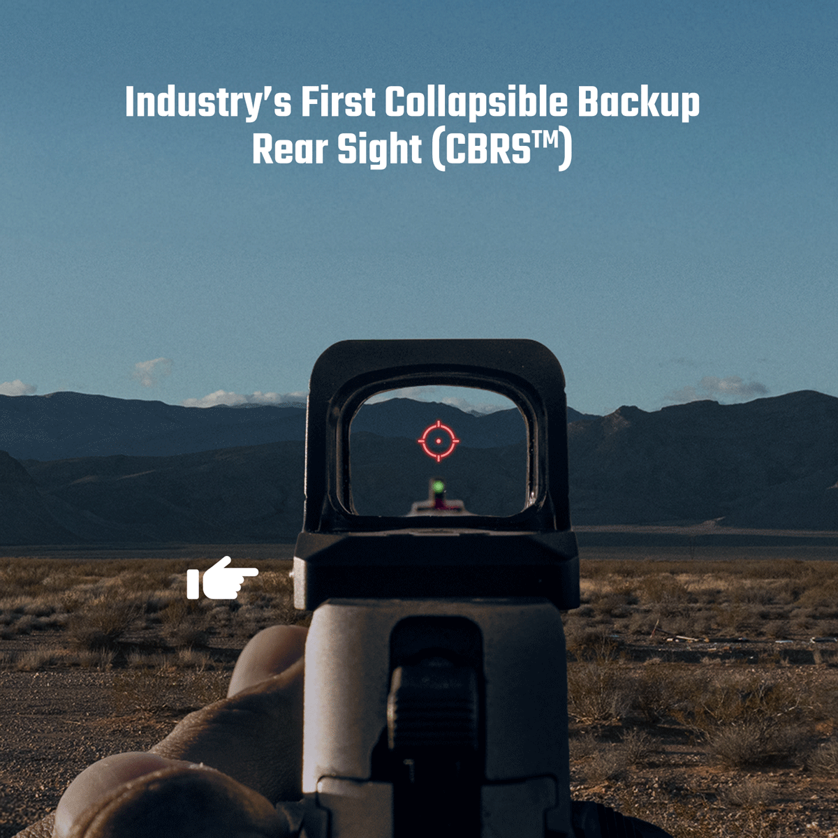 First Collapsible Backup Rear Sight (CBRS™) on a handgun, red dot aiming in desert landscape, mountains background