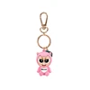 Olight Pink i3E Keychain Side View with Character Design and Gold Clasp for Everyday Carry and Accessory Use