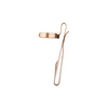 Rose gold metal paper clip on white background