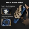 Gloved hand holding a flashlight, highlighting the textured tail button and hexagonal side button for reliable operation.