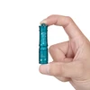 Olight Teal I3E Flashlight held in fingers with star and dot patterns, for everyday carry.