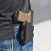 Olight Black EDC bag, a belt-worn holster for firearm carry.