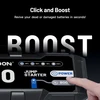 Finger pressing the boost button on a portable car jump starter to revive dead batteries.