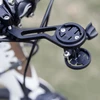 Black bicycle handlebar mount for GPS computer and action camera.