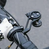 Black bicycle handlebar with Olight and GPS bike computer mount.