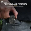 HX Outdoors pocket multitool being slipped into a jeans pocket, showcasing its compact and portable design.