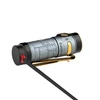 Olight Metallic Gray Baton 4 Premium EDC flashlight side view with textured body, gold clip, charging via magnetic cable.