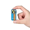 Olight Blue Oclip Pro Held in Hand with Striped Design and Multi-light for Everyday Carry and Illumination
