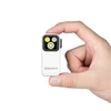 Olight White Oclip Pro Compact Clip-on Light Held in Hand Showing Tri-color LED Beams for EDC and Outdoor Use