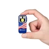 Olight blue Oclip Pro S held in hand, showing its American flag design, for everyday carry and illumination.