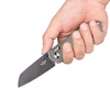 Hand holding gray folding knife with a dark blade and blue accents