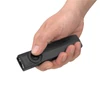 Olight Black ArkPro Lite Flashlight Held in Hand with Finger on Button for Everyday Carry Illumination