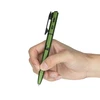 Hand holding a green tactical pen with flashlight and glass breaker, ready for writing or emergency use.
