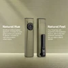 OLIGHT Olive Green Arkfeld Ultra flashlight and laser pointer, front and back view, with pocket clip for everyday carry.
