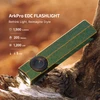 ArkPro EDC Flashlight, 1500 lumens, 205 meters range, 1200mW UV, on natural wood texture