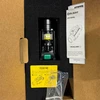 Olight Baldr Pro R weapon light in packaging with user manual, showing laser and light features for tactical use.