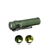 Olight green tactical flashlight with cool white and neutral white beam options illuminating outdoor path at night
