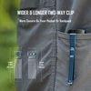 Olight Baton 3 Pro flashlight with a blue two-way pocket clip attached to a grey outdoor trouser pocket