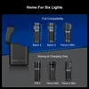 Olight black wireless charger case, open, showing compatibility with Baton 4 and other flashlights for convenient storage and charging.