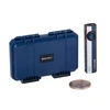 Olight Arkfeld Pro flat flashlight with blue protective hard case and commemorative copper coin on white background