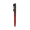 Red and black tactical penlight with laser pointer and textured grip isolated on white background