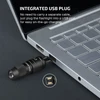 Olight flashlight with integrated USB plug charging directly from a laptop for portable convenience.