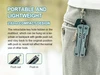 Compact NexTool multitool with retractable key ring attached to belt loop, showing lightweight and portable EDC design.