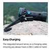Olight black Marauder Mini 2 flashlight with integrated USB-C charging cable lanyard for easy charging on a rock.