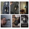 Olight Black Oclip Pro LED light hanging from a carabiner with keys for everyday carry.