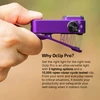 Olight Purple Oclip Pro LED light held by hand, showcasing the clip and control knob for versatile use.