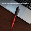 Olight OPen 3 red and black tactical pen resting on a laptop keyboard trackpad showing 6.10 inches length size measurement