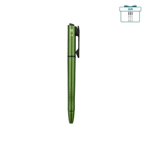 Green aluminum tactical pen with bolt action, pocket clip, and patterned grip, isolated on white background.